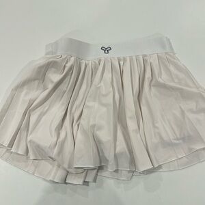 TNA athletic tennis skirt no size marked but size medium EUC